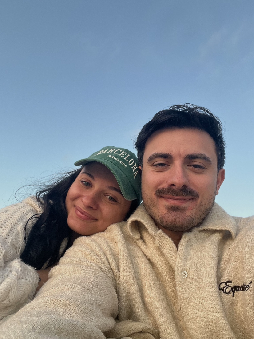 Man holding hand with woman